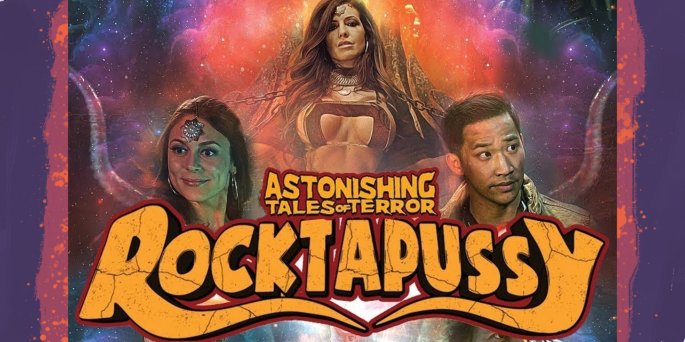 Cast of Rocktapussy stands together with title card.