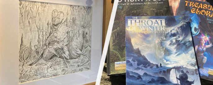 Framed art of Krampus and the print copy of The Throat of Winter.